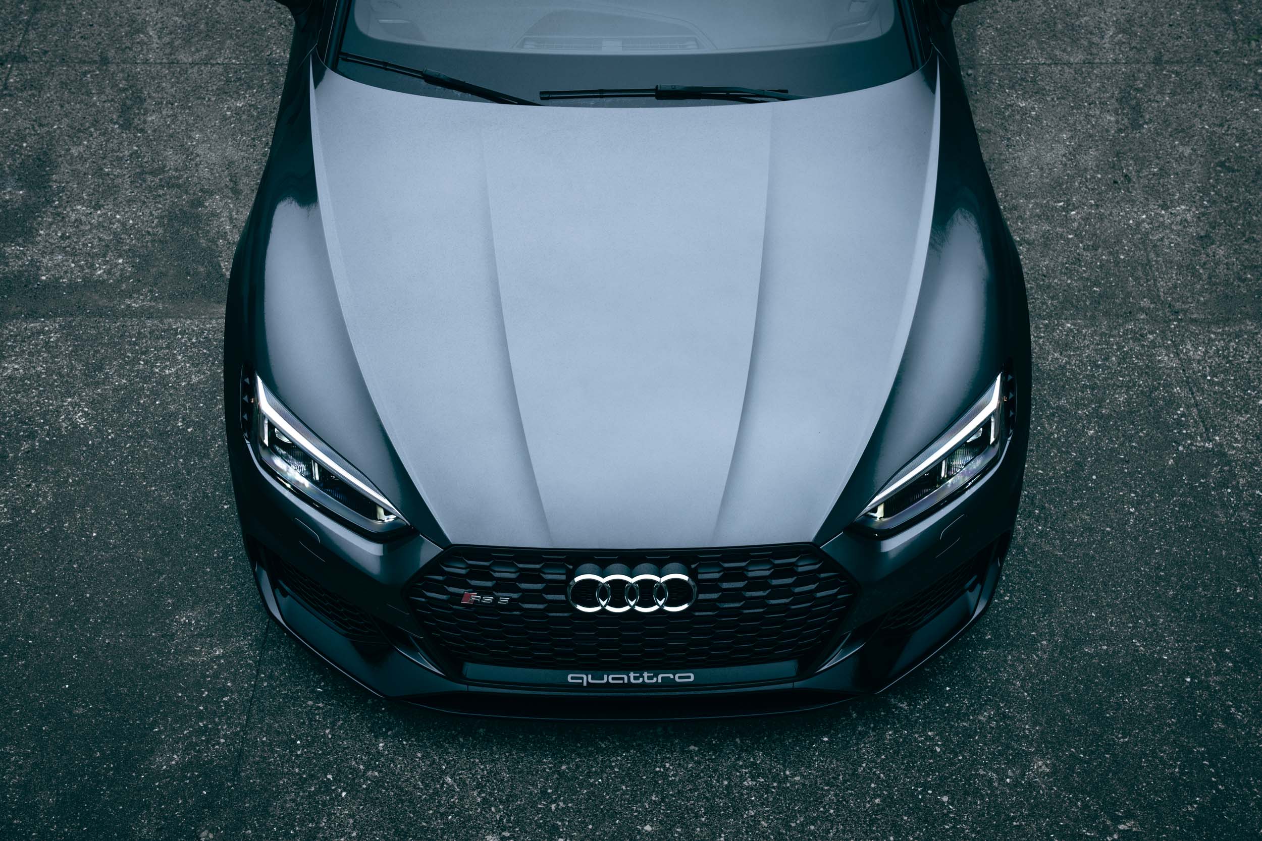 A top down angle of the hood of a grey Audi R S5